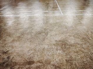 Newly polished concrete floor in a basketball court in Frankston VIC.